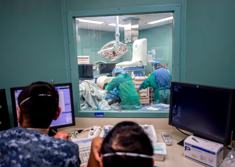 USNS Mercy Sailors Treat Patient (49770775066)