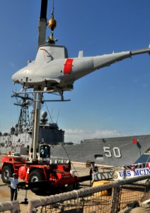 US Navy 100416-N-0486G-006 An MQ-8B Fire Scout Vertical Takeoff and Landing Unmanned Aerial Vehicle's (VTUAV) is craned off the guided-missile frigate USS McInerney (FFG 8)