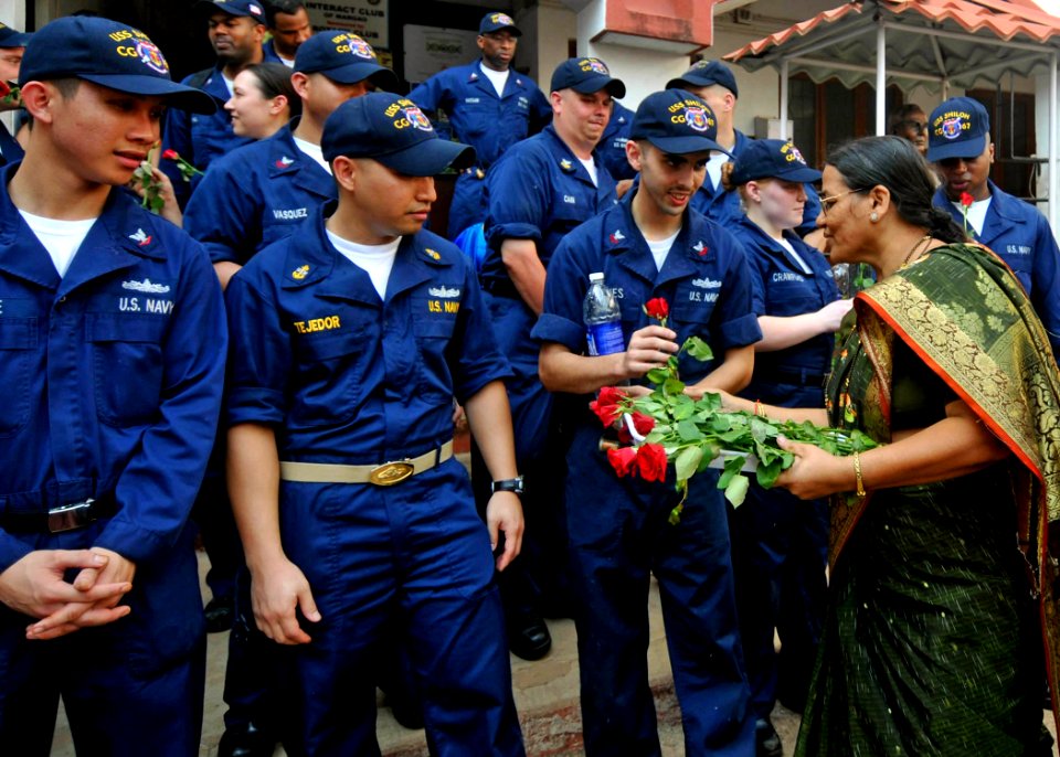 US Navy 100423-N-2013O-017 Sailors receive flowers following a community service project in Goa, India