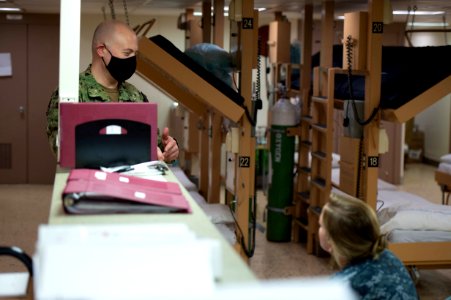 USNS Mercy Religious Program Specialist and Chaplain Makes Rounds (49826997566)