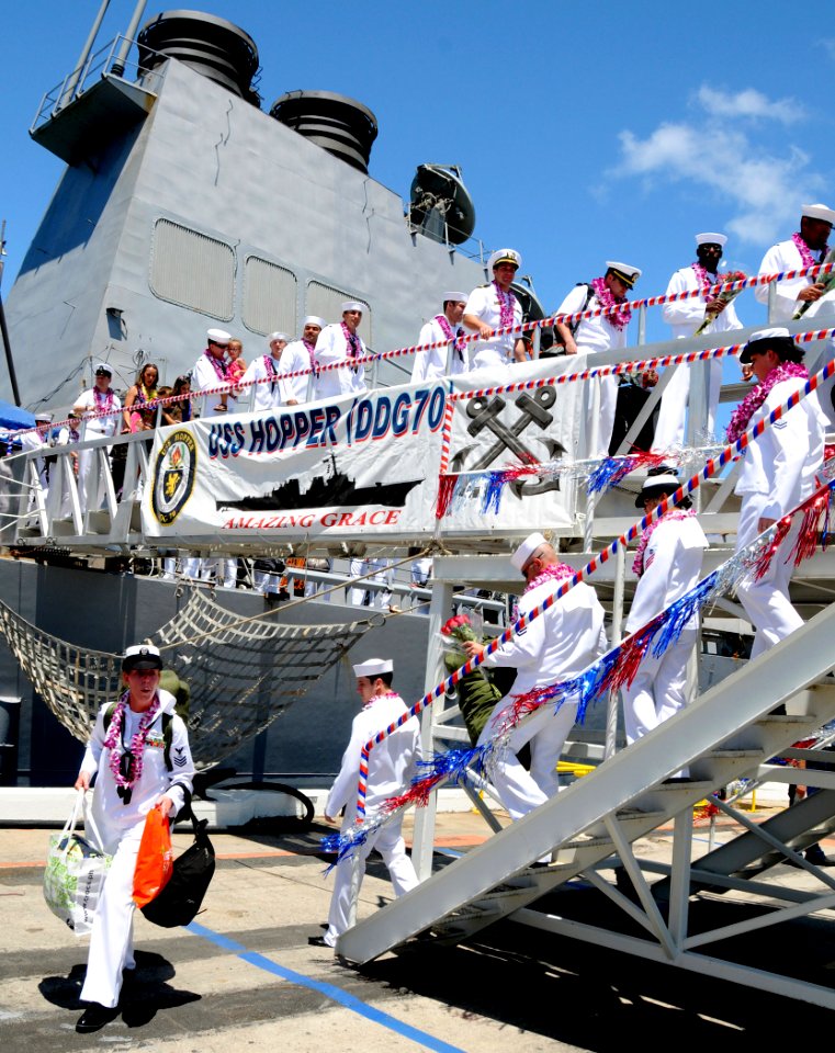 US Navy 100423-N-3666S-086 Sailor disembark USS Hopper (DDG 70) to greet their families upon returning to Joint Base Pearl Harbor-Hickam after a seven-month deployment