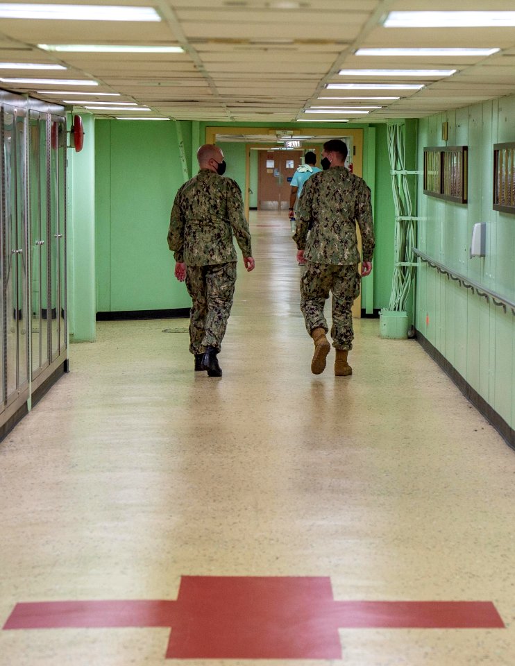 USNS Mercy Religious Program Specialist and Chaplain Makes Rounds (49826998036)