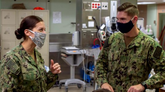 USNS Mercy Religious Program Specialist and Chaplain Makes Rounds (49826998286)