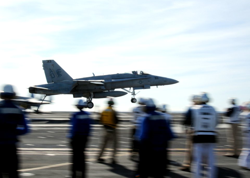 US Navy 100419-N-7908T-610 An F-A-18 Hornet assigned to Strike Fighter Squadron (VFA) 106 lands aboard the aircraft carrier USS George H.W. Bush (CVN 77)