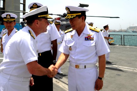 US Navy 100421-N-8959T-005 Vice Adm. Bill Gortney, commander of Combined Maritime Forces and U.S. Naval Forces Central Command, greets Korean navy Rear Adm. Lee Beom-Rim
