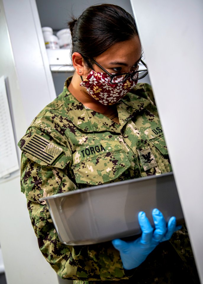 USNS Mercy Sailor Inventories Medicine (49834024716)