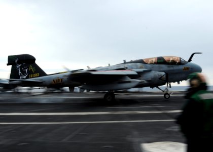 US Navy 100421-N-7908T-617 An EA-6B Prowler, assigned to Electronic Attack Squadron (VAQ) 209, lands aboard the aircraft carrier USS George H.W. Bush (CVN 77)