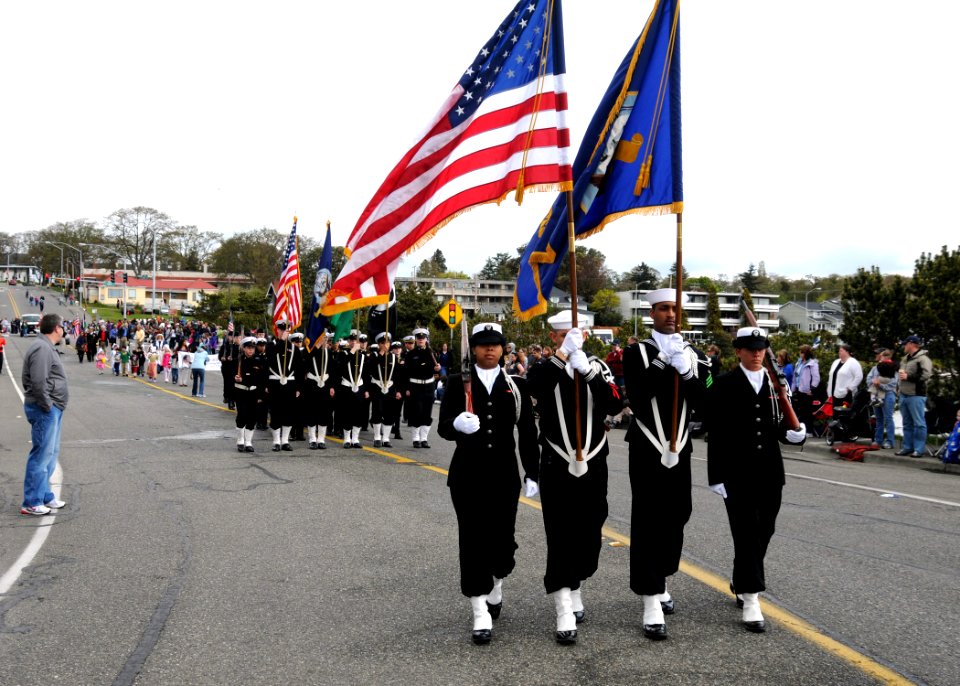 US Navy 100424-N-9860Y-001 Members of the Fleet Readiness Center Northwest Color Guard march down Bayshore Drive during the Holland Happening Grand Parade