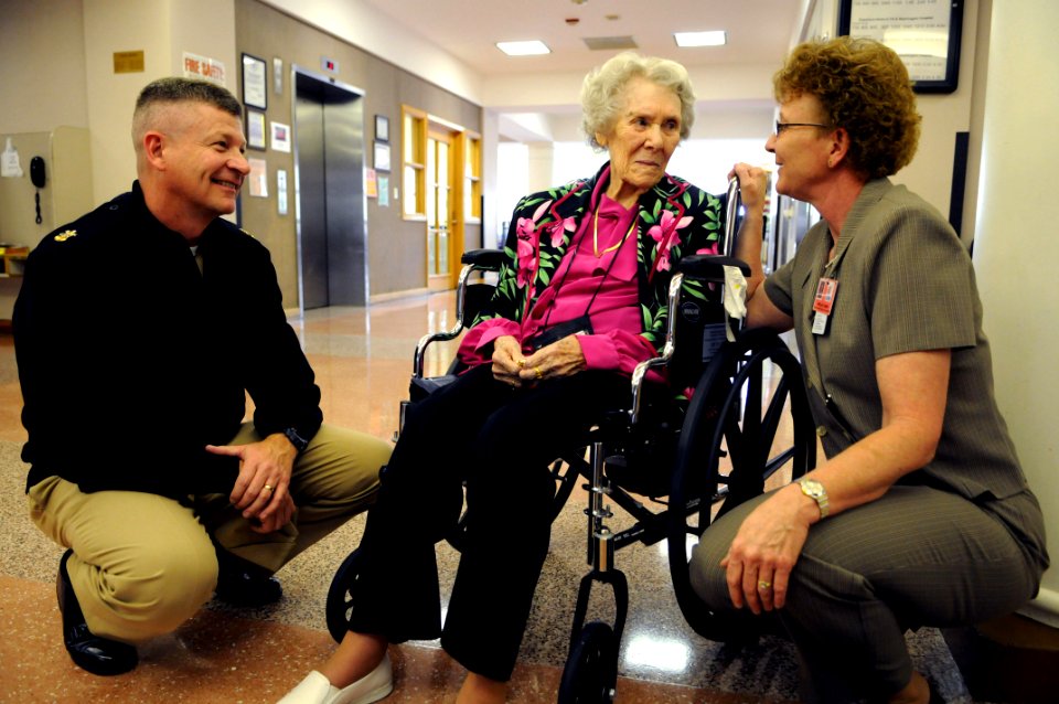 US Navy 100421-N-9818V-201 Master Chief Petty Officer of the Navy (MCPON) Rick West meets with Edyth Jackman, who just celebrated her 100th birthday