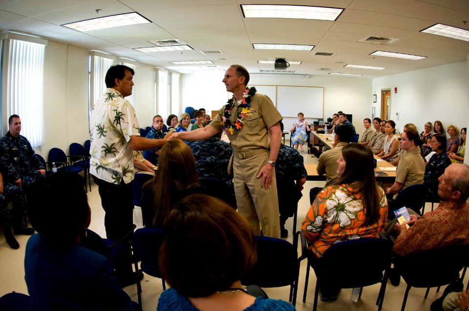US Navy 100423-N-6674H-003 Vice Chief of Naval Operations Adm. Jonathan W. Greenert greets Sailors and staff at Navy Region Hawaii's Fleet and Family Support Center during a roundtable discussion