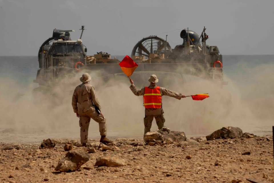 US Navy 100423-N-3358S-057 Sailors assigned to Beachmaster Unit (BMU) 2, embarked aboard the amphibious transport dock ship USS Mesa Verde (LPD 19), direct Landing Craft Air Cushion (LCAC) 87, assigned to Assault Craft Unit (AC