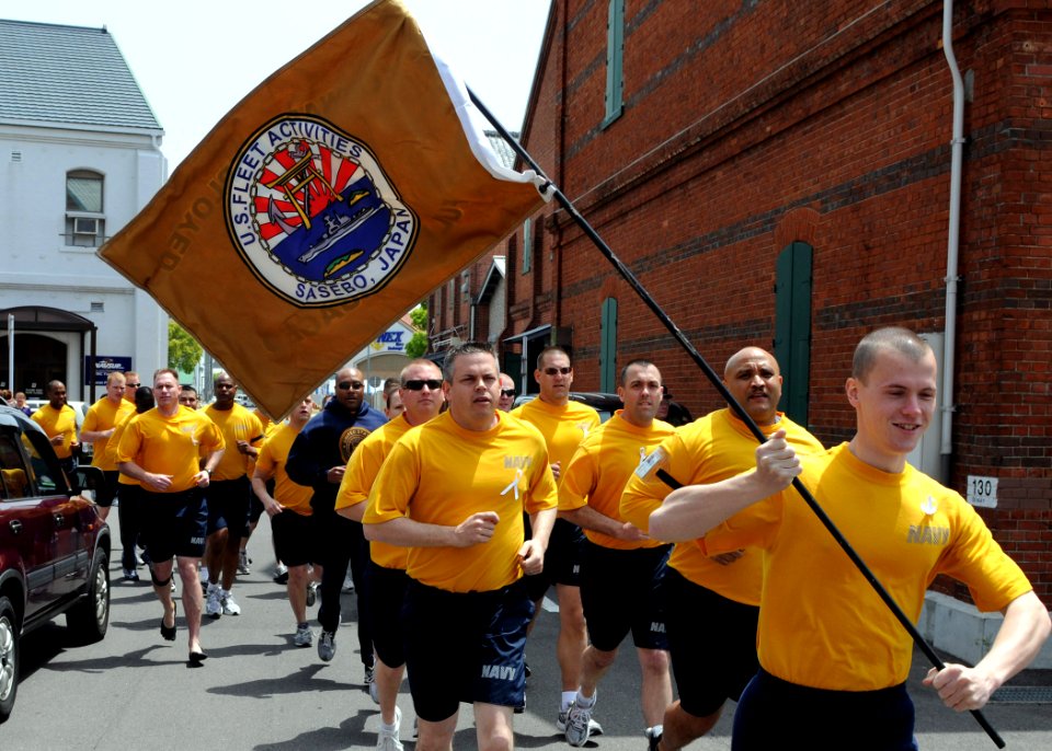US Navy 100428-N-5538K-036 Service members from Fleet Activities Sasebo participate in a Sexual Assault Awareness 5-kilometer run. Participants wore white ribbons to spread awareness of the effects of sexual assault on a commun