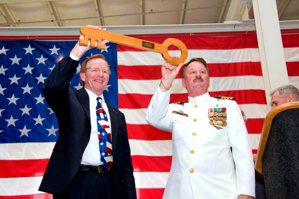 US Navy 100423-N-2728S-075 Mike Carrell, chairman of the Port Commission for the Port of Corpus Christi Authority, left, and Capt. Leland Taylor, commanding officer of Naval Station Ingleside, Texas