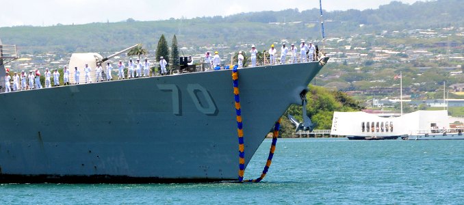US Navy 100423-N-3666S-009 Sailors man the rails aboard the guided-missile destroyer USS Hopper (DDG 70) as she makes her way into Joint Base Pearl Harbor-Hickam after a scheduled seven-month deployment
