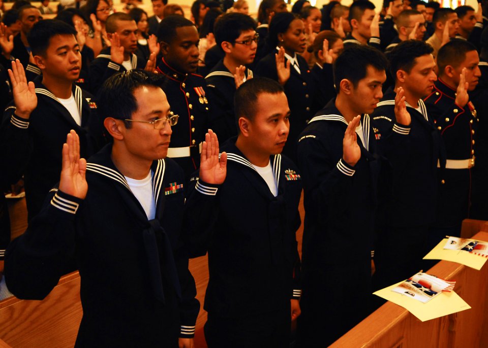 US Navy 100423-N-2218S-001 Service members take the Oath of Allegiance during a naturalization ceremony at the Chapel of Hope at Commander, Fleet Activities Yokosuka