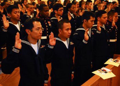 US Navy 100423-N-2218S-001 Service members take the Oath of Allegiance during a naturalization ceremony at the Chapel of Hope at Commander, Fleet Activities Yokosuka
