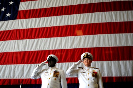 US Navy 100423-N-9818V-254 Force Master Chief Petty Officer Fred Pharr, left, and Rear Adm. Richard O'Hanlon, commander of Naval Air Force Atlantic, render a salute photo