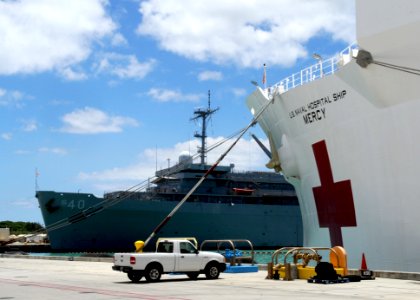 USNS Mercy moored next to USS Frank Cable at Naval Base Guam as Mercy, prepares for Pacific Partnership 2016. (27363208361)
