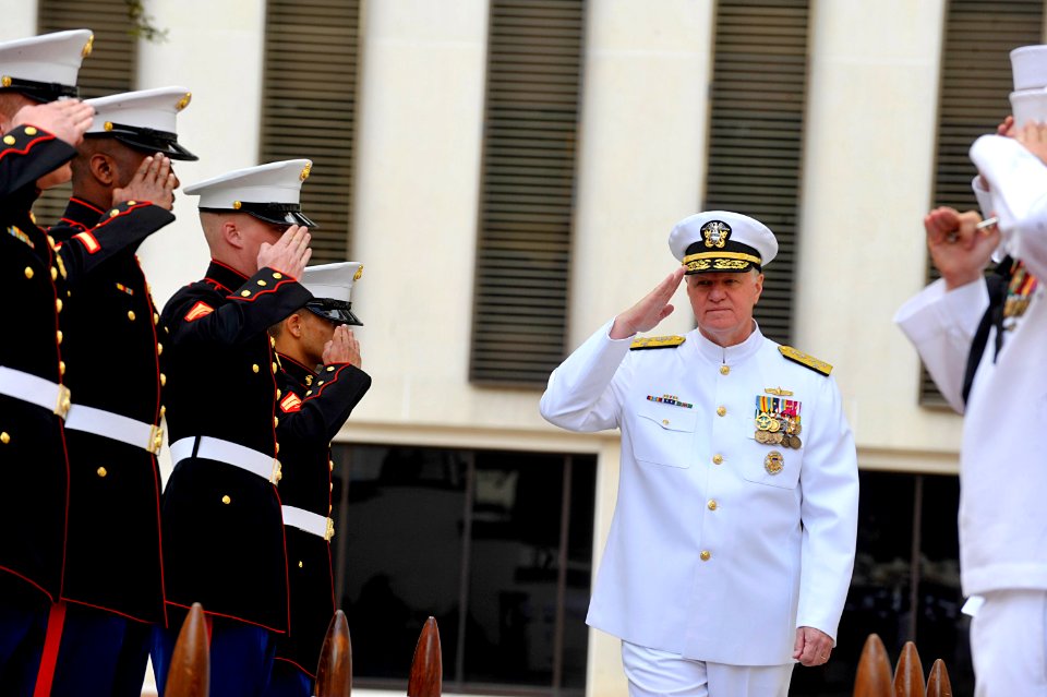 US Navy 100430-N-8273J-044 Adm. Gary Roughead salutes during the arrival of the official party during the Naval Reserve Officers Training Corps commissioning ceremony at Florida A^M University