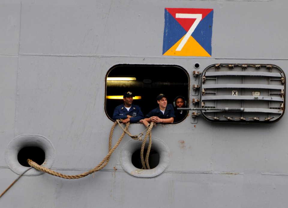 US Navy 100426-N-1522S-011 Sailors prepare to handle lines aboard the multi-purpose amphibious assault ship USS Iwo Jima (LHD 7) at Port Everglades for the start of Fleet Week Port Everglades