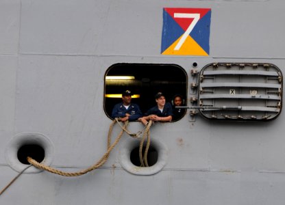 US Navy 100426-N-1522S-011 Sailors prepare to handle lines aboard the multi-purpose amphibious assault ship USS Iwo Jima (LHD 7) at Port Everglades for the start of Fleet Week Port Everglades