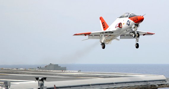 US Navy 100424-N-3885H-155 A T-45C Goshawk training aircraft assigned to Carrier Training Wing (CTW) 2 takes off after completing a touch-and-go landing