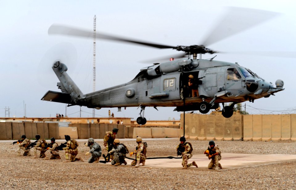 US Navy 100427-N-0879R-998 Iraqi Special Operations Forces soldiers set a perimeter after fast-roping insertion training