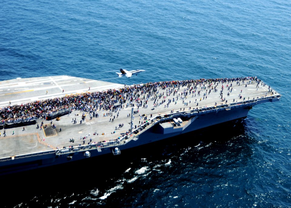 US Navy 100501-N-8913A-128 An F-A-18A- Hornet performs a touch-and-go aboard USS George H.W. Bush (CVN 77)