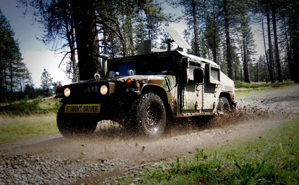 US Navy 100428-N-6538W-036 Sailors drive a high mobility multipurpose vehicle during an HMMV training course at Fort Lewis, Wash