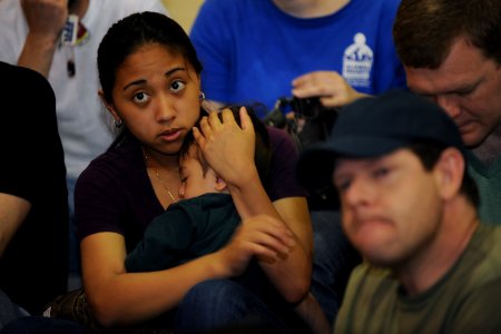 US Navy 100505-N-5862D-001 Navy service members and their dependents listen to a safety brief before being allowed back to their homes in the base housing area of Naval Support Activity Mid-South