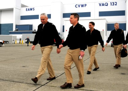 US Navy 100430-N-9860Y-003 Capt. Tom Slais, commodore of Electronic Attack Wing, U.S. Pacific Fleet, discusses the future of the electronic attack community with Rear Adm. Michael Lyden, commander of Naval Supply System Command