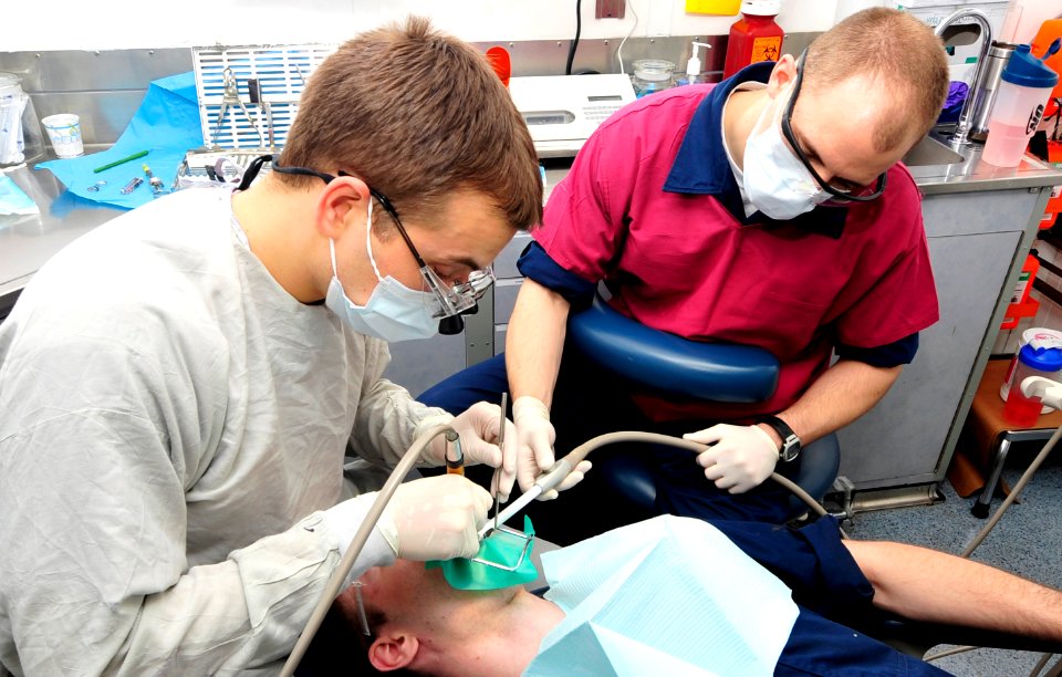 US Navy 100505-N-6935K-002 Lt. Brad Norden and Hospital Corpsman Seaman Kyle Zunn perform a routine check-up aboard USS Dwight D. Eisenhower (CVN 69)