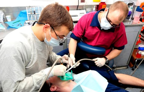 US Navy 100505-N-6935K-002 Lt. Brad Norden and Hospital Corpsman Seaman Kyle Zunn perform a routine check-up aboard USS Dwight D. Eisenhower (CVN 69)