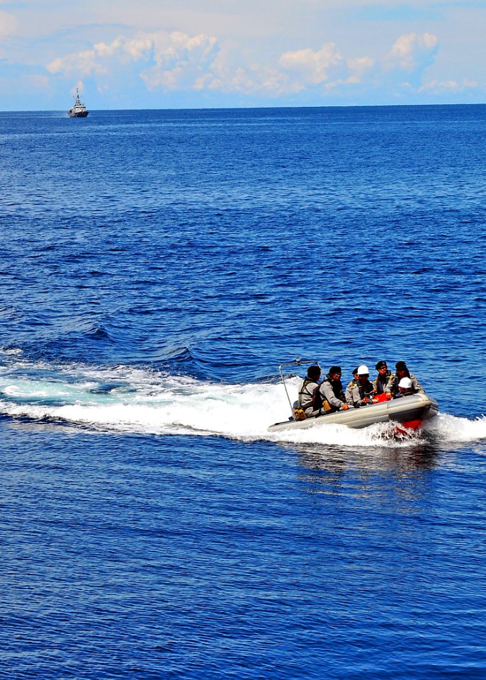 US Navy 100506-N-7643B-004 A Royal Brunei Navy boarding team approaches the U.S. Coast Guard cutter Mellon (WHEC 717) during a visit, board, search, and seizure exercise aboard the U.S. Coast Guard cutter USCGC Mellon (WHEC 717