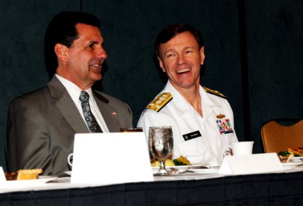 US Navy 100506-N-1522S-002 Vice Adm. James W. Houck shares conversation with Dan McCarthy photo