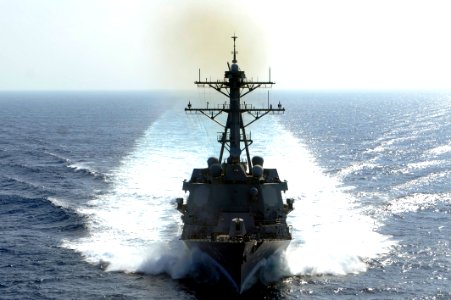 US Navy 100504-N-8959T-388 The Arleigh Burke-class guided-missile destroyer USS Farragut (DDG 99) cruises through the Gulf of Aden during a full power trial photo