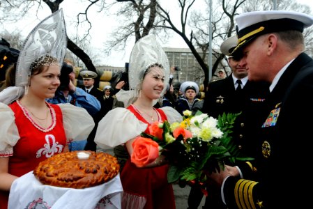 US Navy 100507-N-7280V-342 Capt. Rudy Lupton, commanding officer of the U.S. 7th Fleet command ship USS Blue Ridge (LCC 19), takes part in a bread and salt ceremony