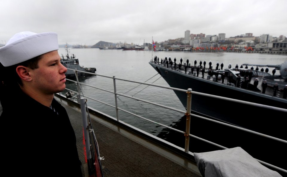 US Navy 100507-N-7280V-191 Damage Controlman 3rd Class Shane Johnston mans the rails aboard the U.S. 7th Fleet command ship USS Blue Ridge (LCC 19) as the ship pulls into Vladivostok, Russia