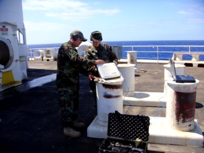 US Navy 100506-N-0000M-004 Master Chief Hospital Corpsman Denise Becker and Lt. Cmdr. Arthur Prevatte, both assigned to Maritime Civil Affairs and photo