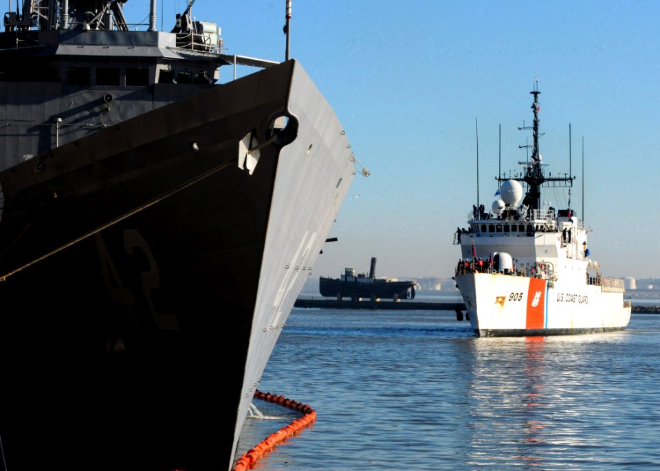 US Navy 100509-N-9301W-624 USCGC Spencer (WMEC 905) pulls into the harbor behind USS Klakring (FFG 42) while in Montevideo, Uruguay