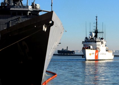 US Navy 100509-N-9301W-624 USCGC Spencer (WMEC 905) pulls into the harbor behind USS Klakring (FFG 42) while in Montevideo, Uruguay