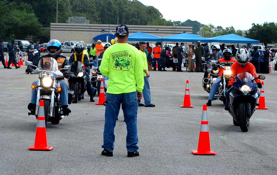US Navy 100506-N-3436L-002 Motorcyclists participate in a two-lane slow race to test their abilities on the road during the 5th annual Recreational Safety Rodeo at Naval Air Station Jacksonville