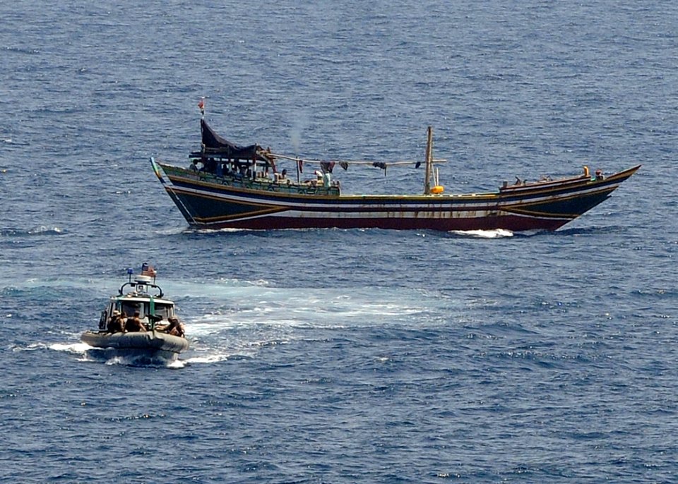 US Navy 100507-N-1082Z-073 The approach and visit team from the amphibious dock landing ship USS Ashland (LSD 48) inspect fishing dhows during maritime security operations