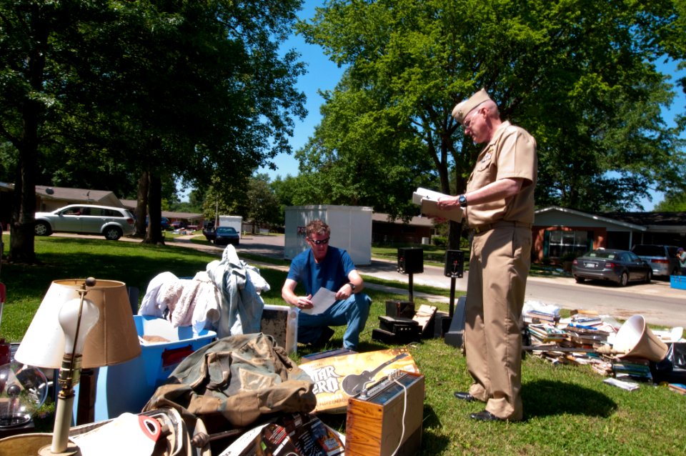 US Navy 100507-N-5319A-011 Cmdr. Rob Callison, base chaplain at Naval Support Activity-Mid South, speaks with retired Lt. Cmdr. Kevin Christie who was trying to recover a damaged hard drive