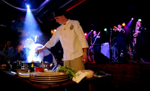 US Navy 100510-N-5716H-408 Culinary Specialist 2nd Class Kevin Massey lays his steak on the grill during a cooking competition between Sailors embarked aboard the U.S. 7th Fleet command ship USS Blue Ridge (LCC 19) and Russian