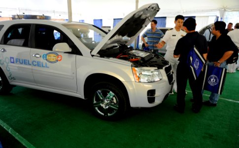 US Navy 100506-N-7676W-012 Lt. Dong Park explains how a fuel cell vehicle works during Public Service Recognition Week on the National Mall in Washington, D.C