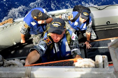 US Navy 100506-N-8959T-018 Australian navy Chief Petty Officer Stephen Ellis embarks the Arleigh Burke-class guided-missile destroyer USS Farragut (DDG 99) during a personnel exchange