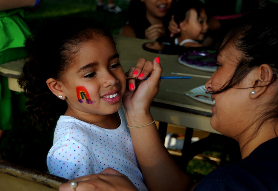 US Navy 100507-N-6046S-070 Children enjoy a free concert and face painting during a free Morale Warfare and Recreation sponsored concert at Naval Support Activity Mid-South