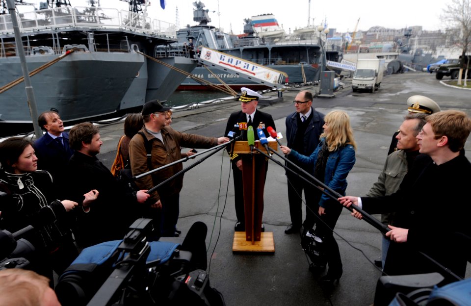 US Navy 100507-N-7280V-343 Capt. Rudy Lupton greets reporters pierside during a press availability event with the local media as Blue Ridge arrives in Vladivostok, Russia