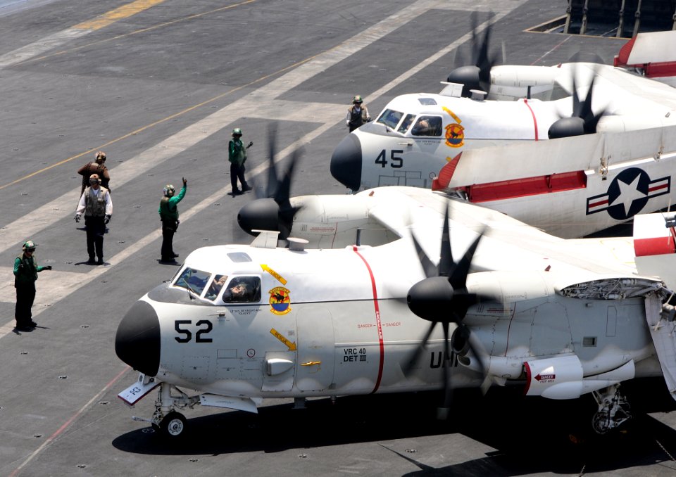 US Navy 100511-N-4236E-139 C-2A Greyhound transport aircraft assigned to the Rawhides of Fleet Logistics Support Squadron (VRC) 40 start their engines on the flight deck of the aircraft carrier USS Dwight D. Eisenhower (CVN 69)